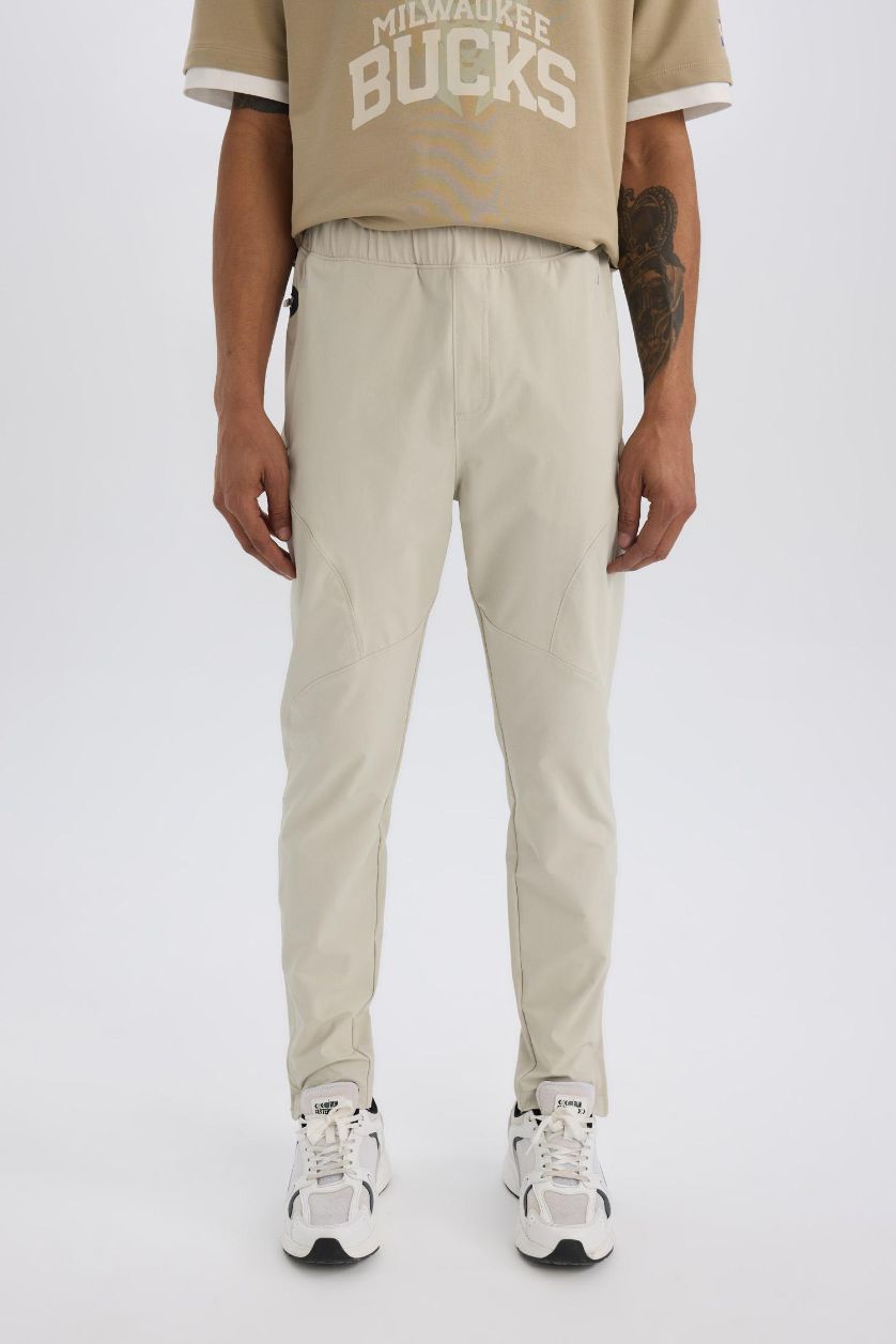 Erkek Açık Bej Esnek Kumaş Sporcu Jogger Eşofman Altı Slim Fit Dar Kesim Dokuma Üç Cepli Fermuarlı Paça
