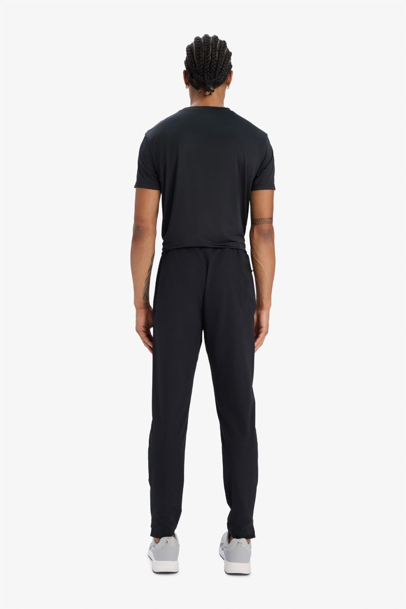 Erkek Siyah Esnek Kumaş Sporcu Jogger Eşofman Altı Slim Fit Dar Kesim Dokuma Üç Cepli Fermuarlı Paça