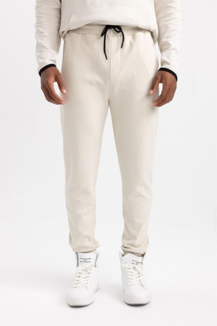 رجالي اللون الحجري بنطلون جوجر سليم فيت بأستك من تحت من DeFactoFit