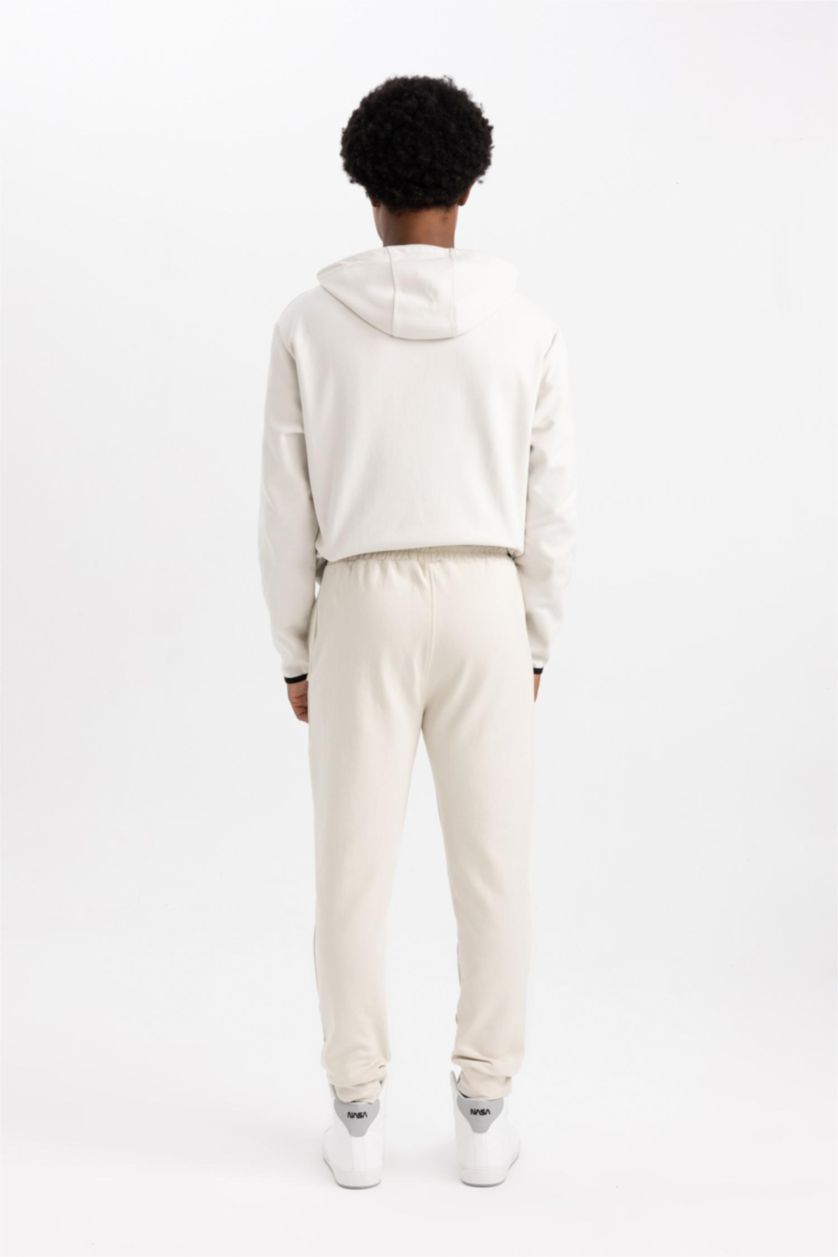 رجالي اللون الحجري بنطلون جوجر سليم فيت بأستك من تحت من DeFactoFit