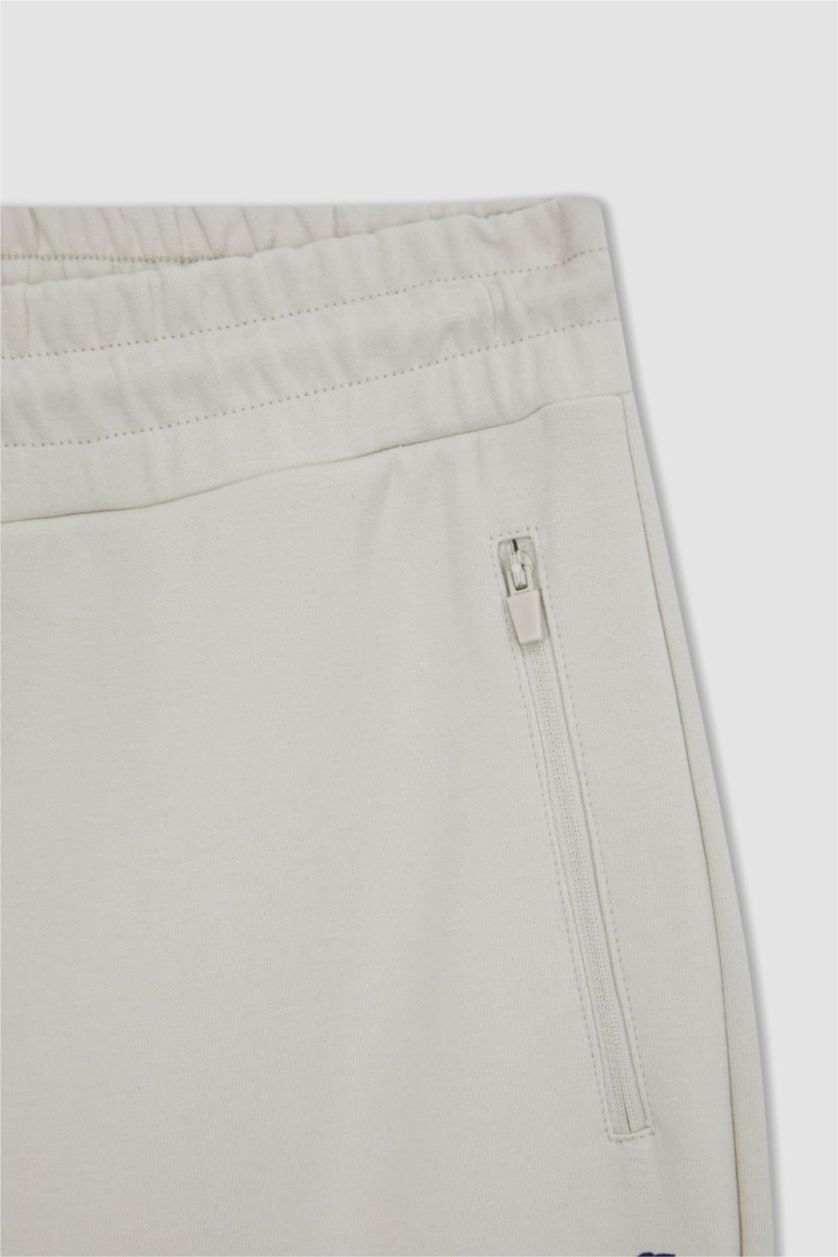 رجالي اللون الحجري بنطلون جوجر سليم فيت بأستك من تحت من DeFactoFit