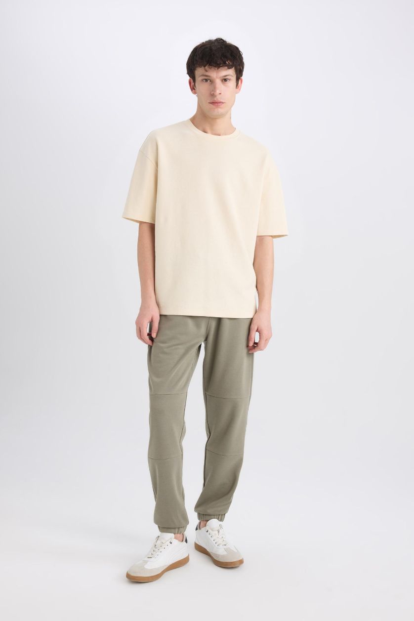 رجال كاكي فاتح بنطلون بجامة رياضي قصة عادية بجيب