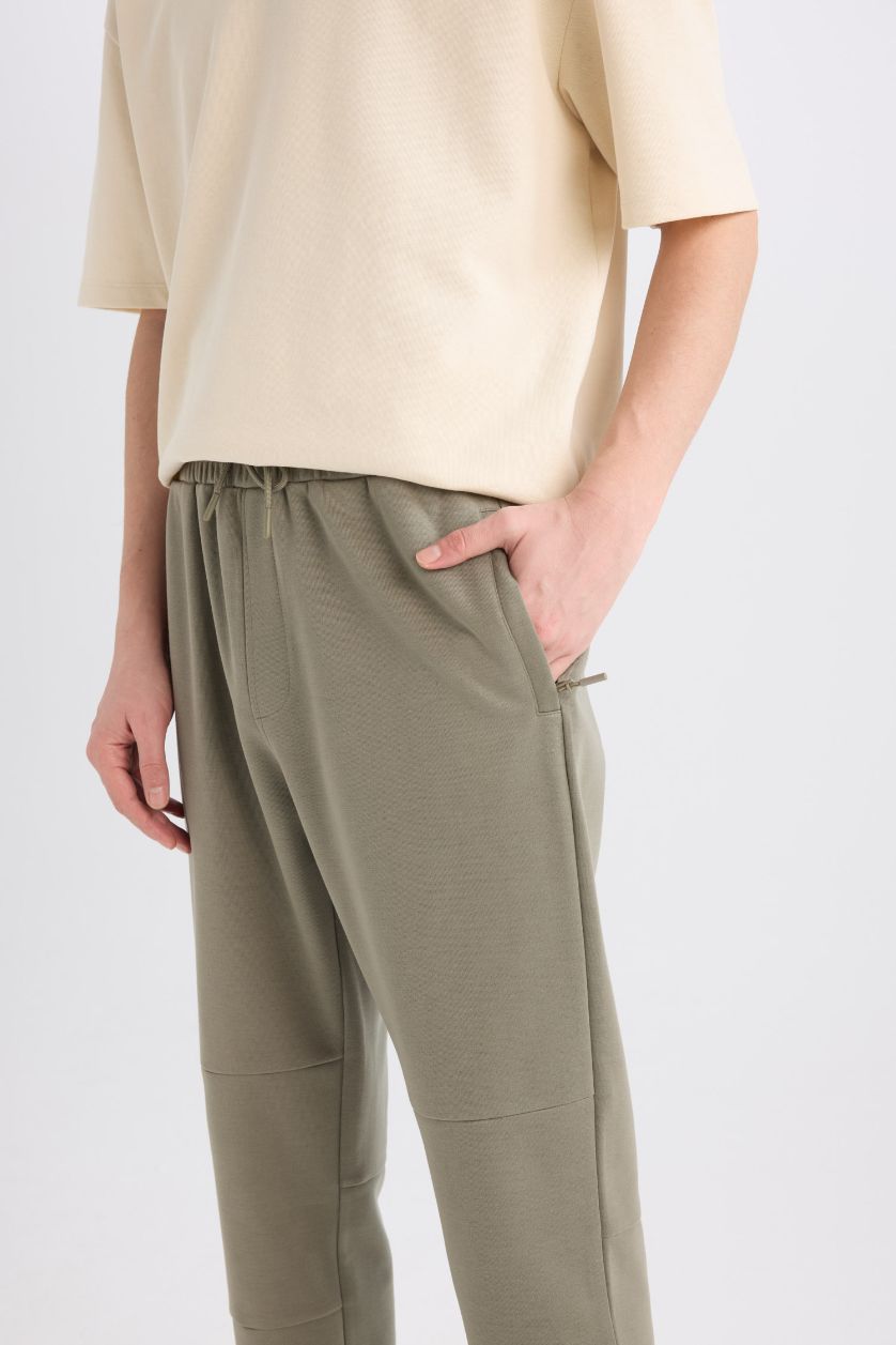 رجال كاكي فاتح بنطلون بجامة رياضي قصة عادية بجيب