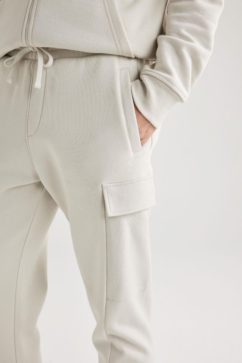 MAN Stone Regular Fit tall hem Fleece Pocket Trousers