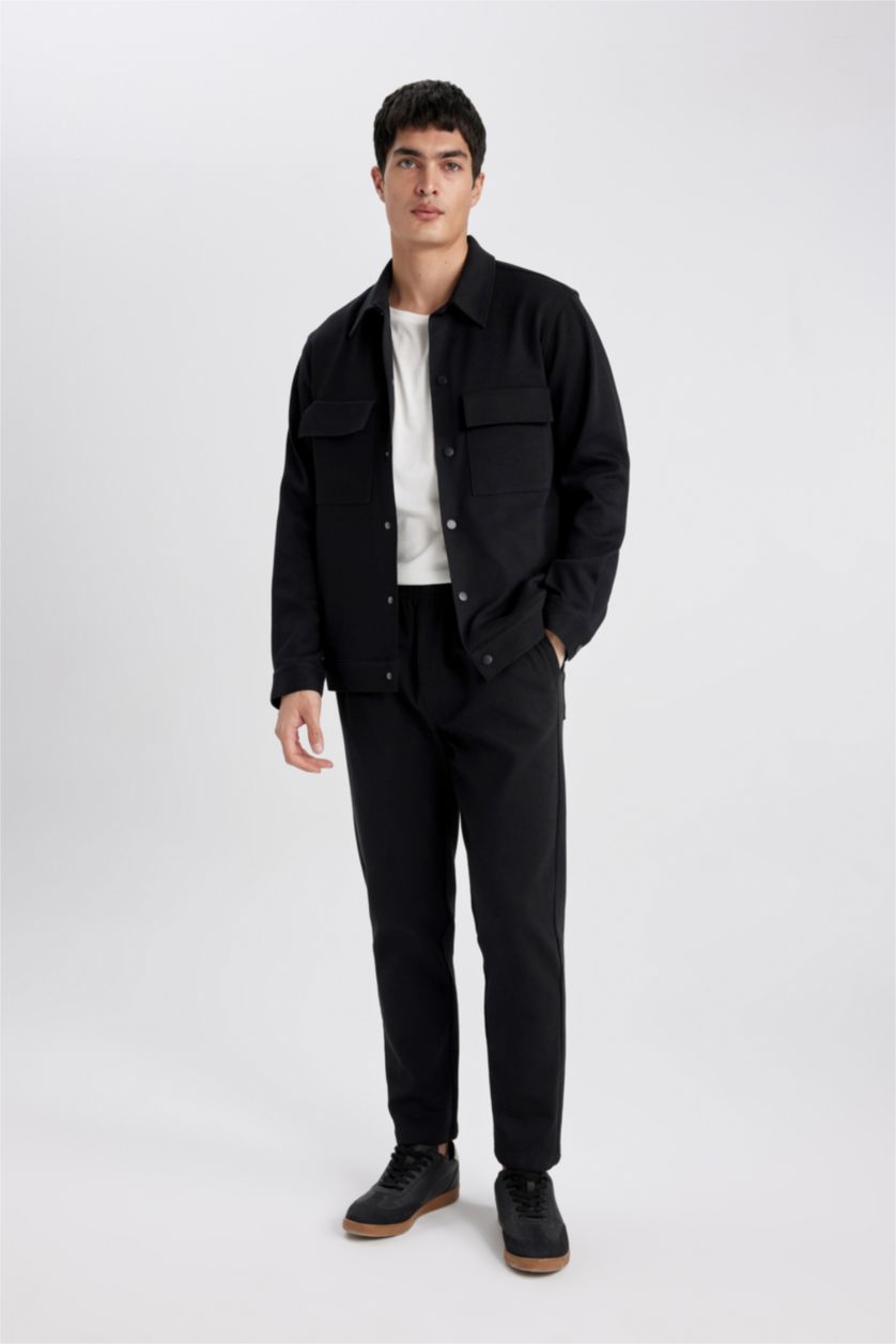 رجال أسود بنطرون قصة مريحة ورجل عادي