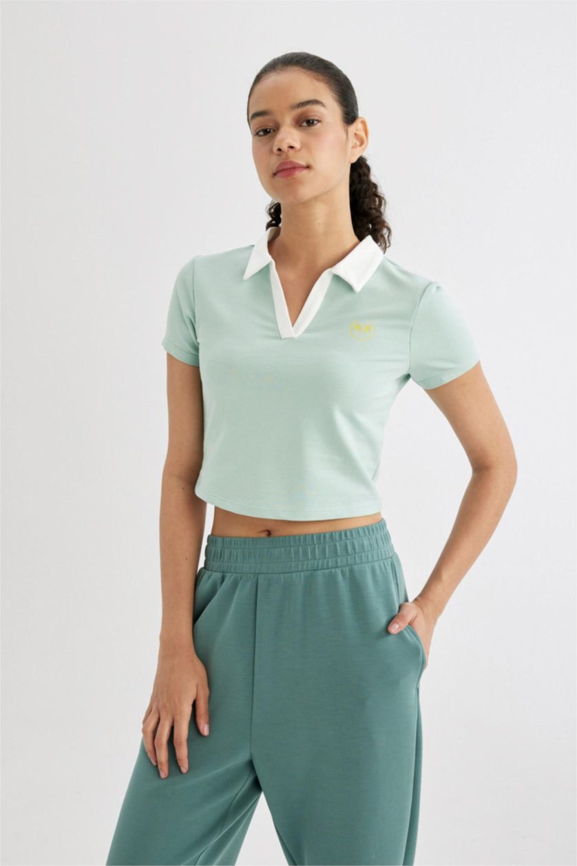 حريمي نعناع تيشيرت رياضي نص كم قصة عادية بياقة بولو من DeFactoFit