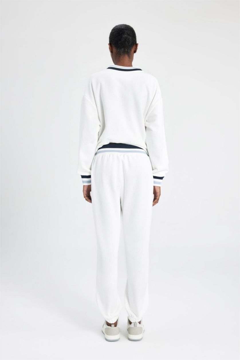 نساء أبيض بنطلون بجامة رياضي قماش سميك قصة عادية بجيب من DeFactoFit