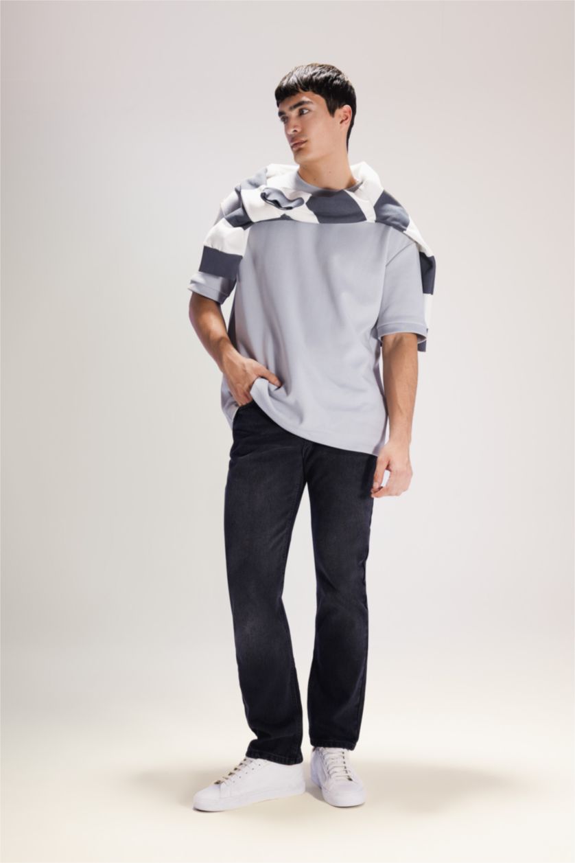 رجال أسود بنطرون جينز قصة مستقيمة وخصر عادي