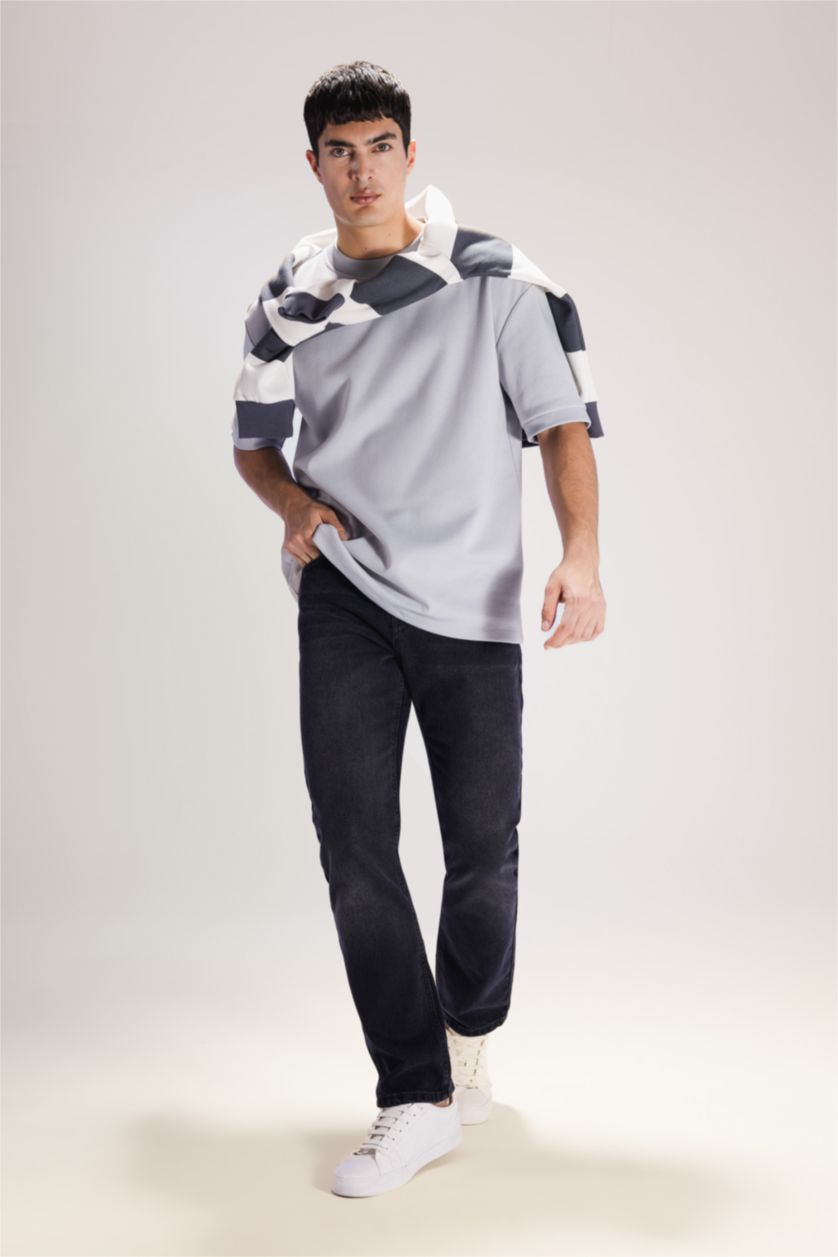 رجال أسود بنطرون جينز قصة مستقيمة وخصر عادي