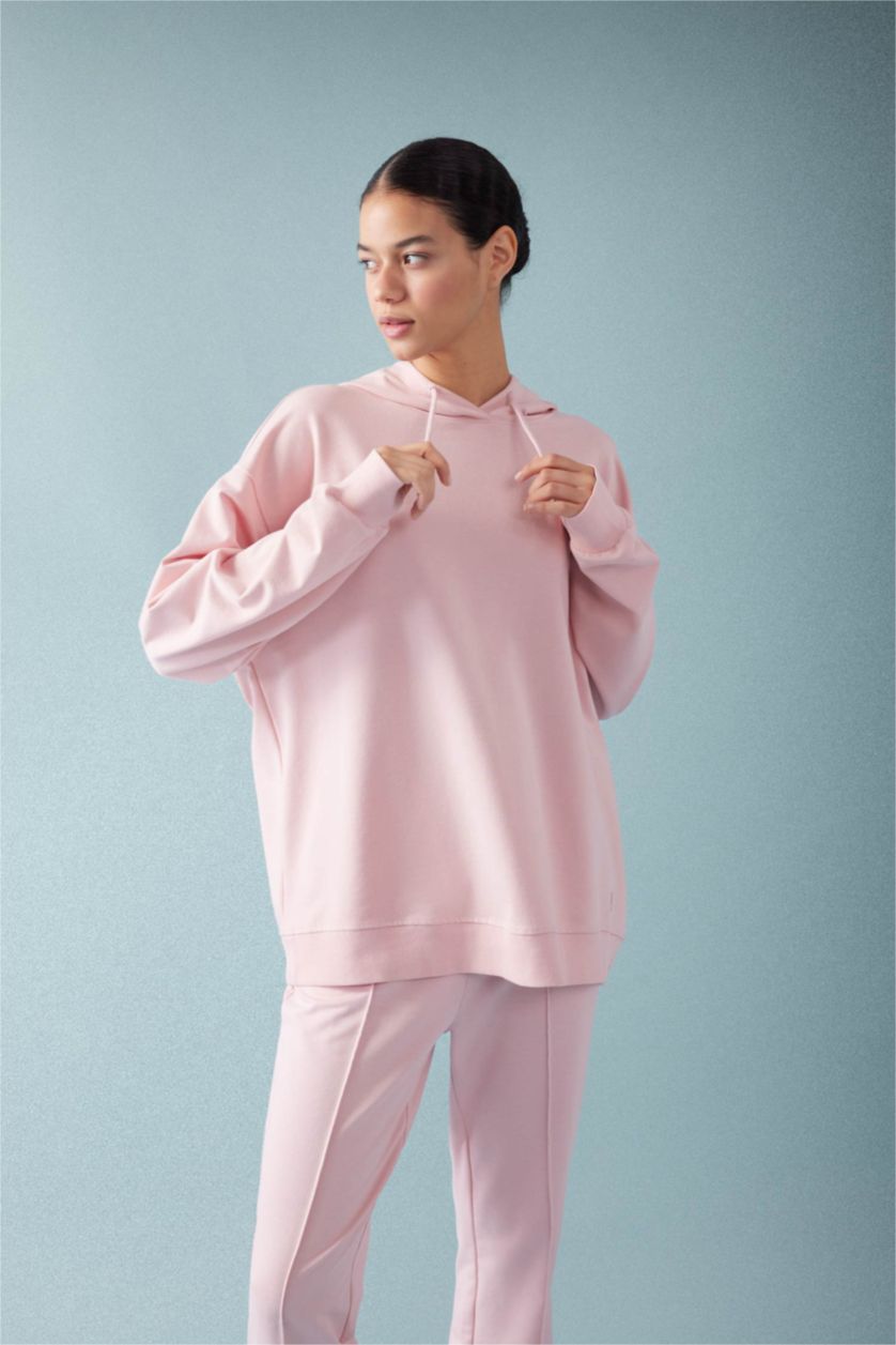 حريمي وردي سويت شيرت رياضي اوفر سايز بكابيشون بجيب من DeFactoFit