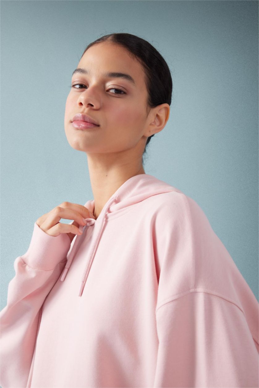 حريمي وردي سويت شيرت رياضي اوفر سايز بكابيشون بجيب من DeFactoFit