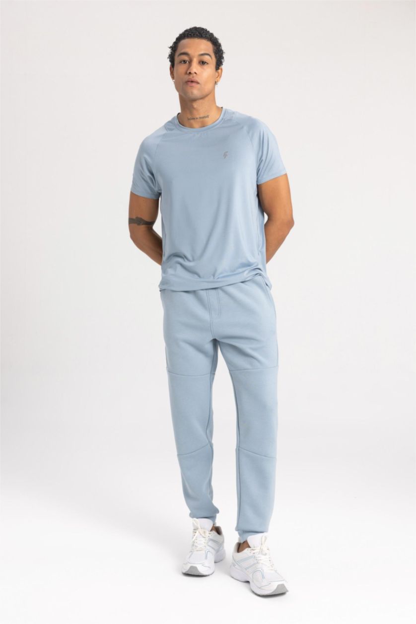 رجالي أزرق بنطلون جوجر سليم فيت وبأستك من تحت من DeFactoFit