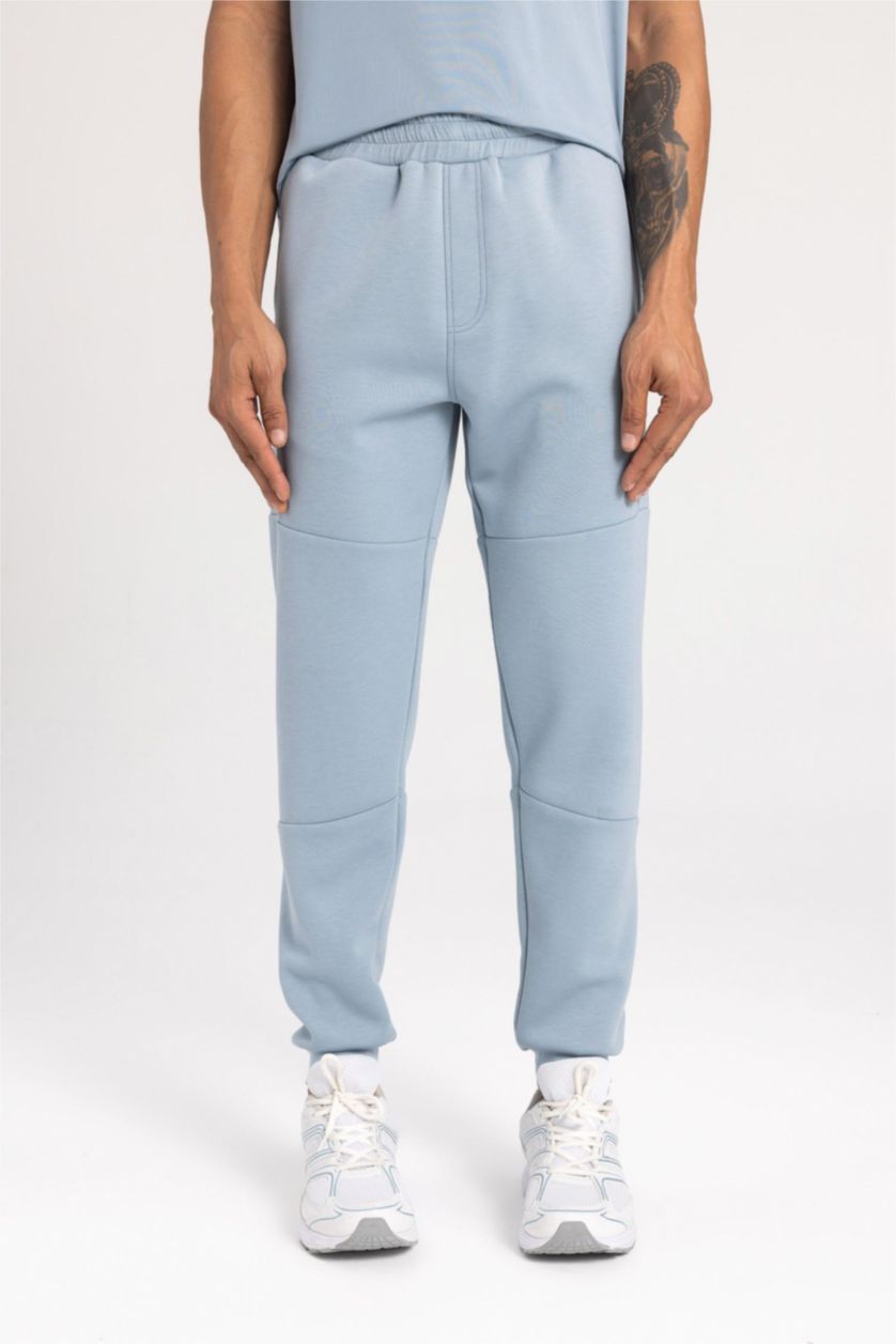 رجالي أزرق بنطلون جوجر سليم فيت وبأستك من تحت من DeFactoFit