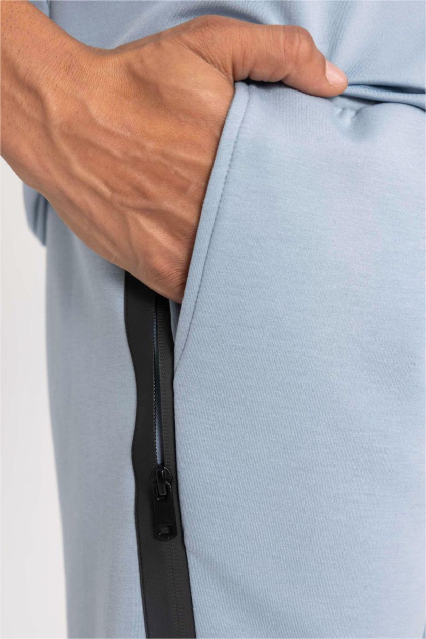 رجالي أزرق بنطلون جوجر سليم فيت وبأستك من تحت من DeFactoFit