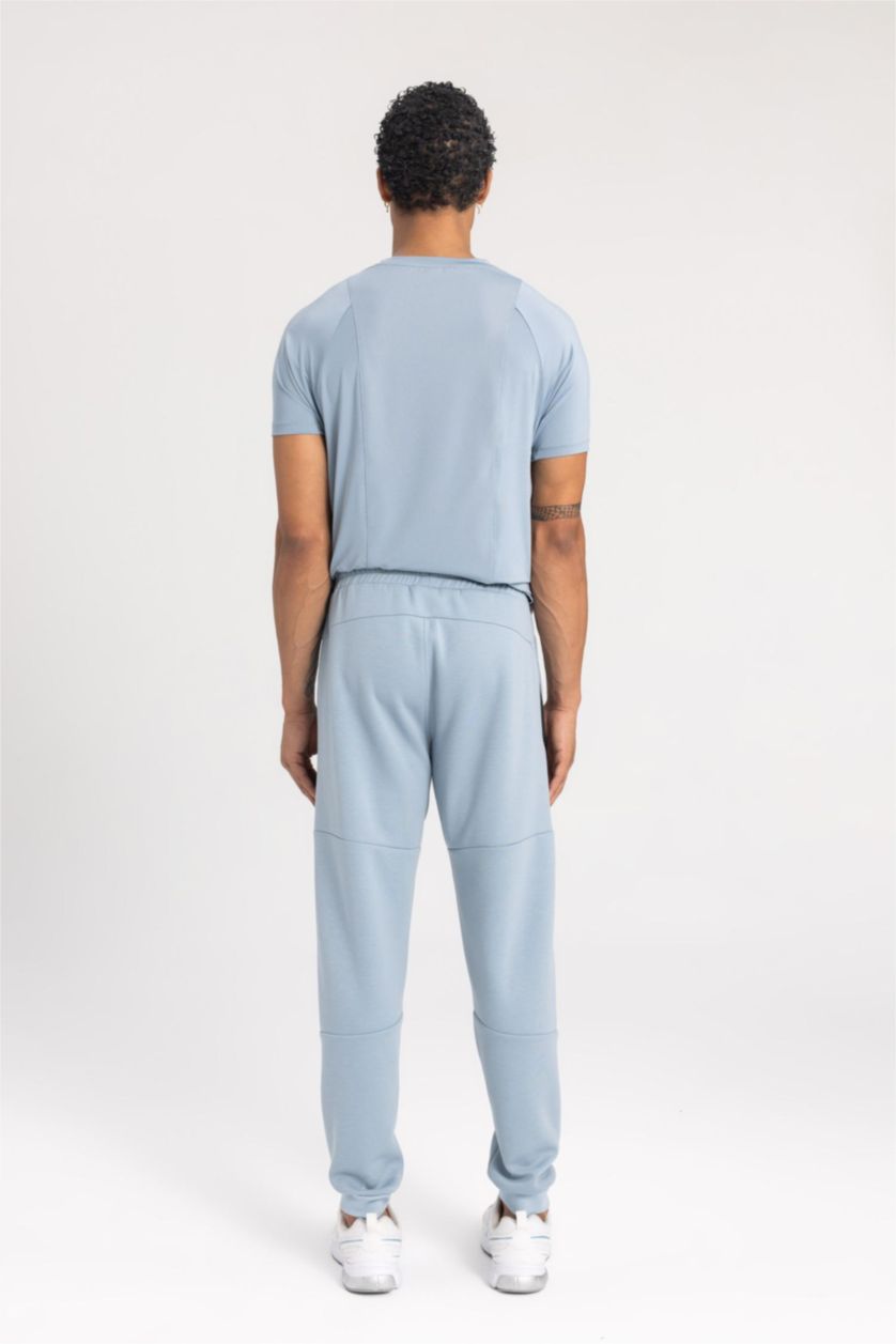 رجالي أزرق بنطلون جوجر سليم فيت وبأستك من تحت من DeFactoFit