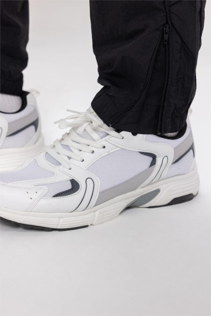 رجال أسود Standard Fit Woven Jogger