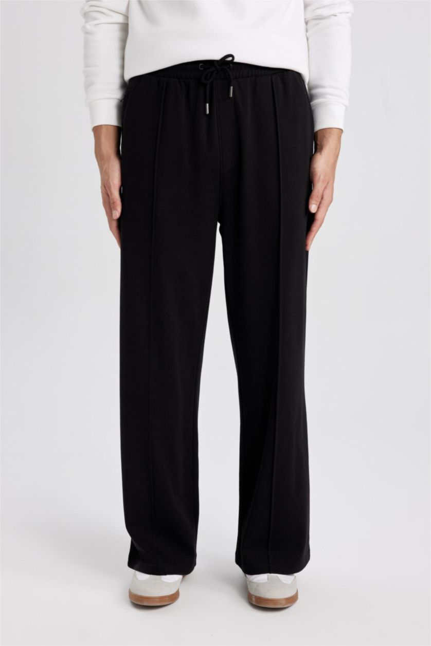 MAN Black Relax Fit Wide Leg Trousers