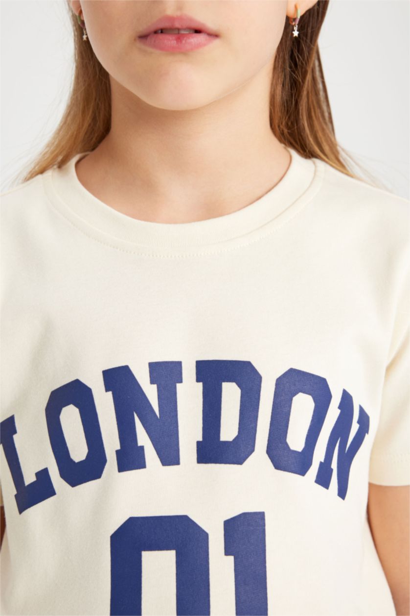 Kız Çocuk - Genç Kız Ekru Kız Çocuk Slim Fit Dar Kesim Bisiklet Yaka Fitilli Kaşkorse Baskılı Kısa Kollu Tişört