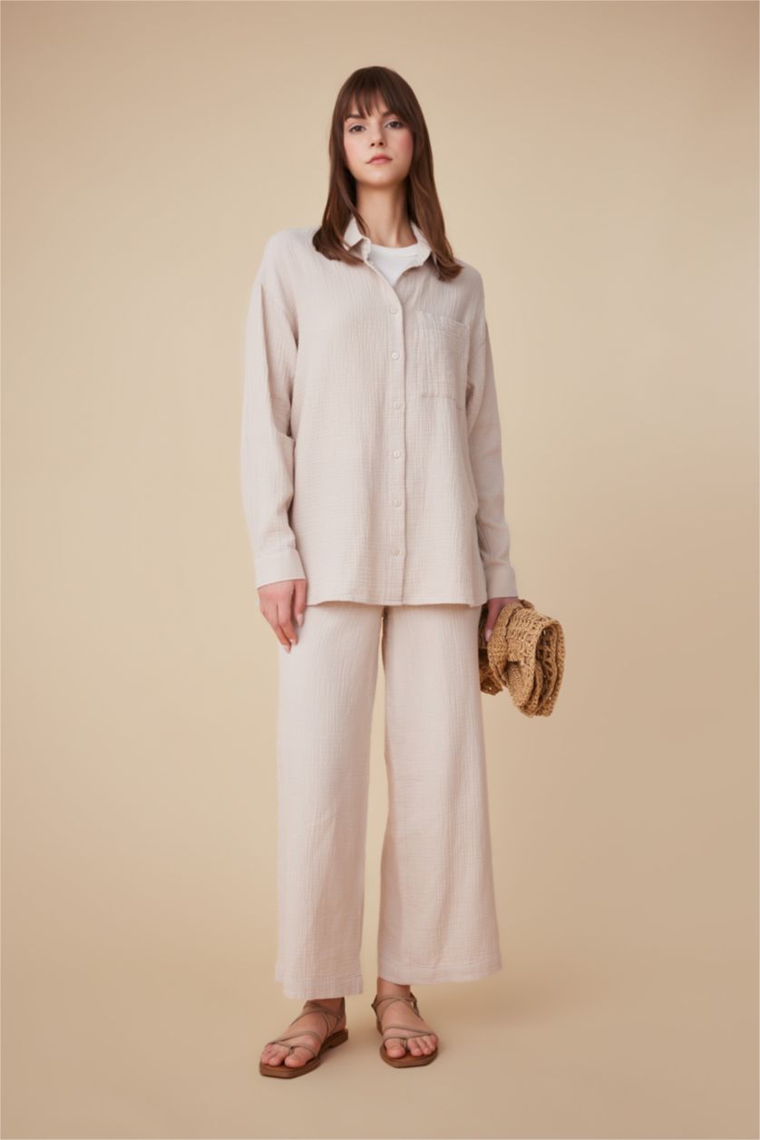 FEMME Beige Pantalon Palazzo Mousseline