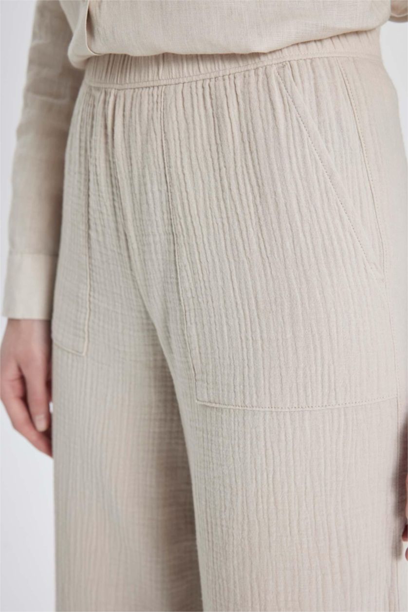 FEMME Beige Pantalon Palazzo Mousseline