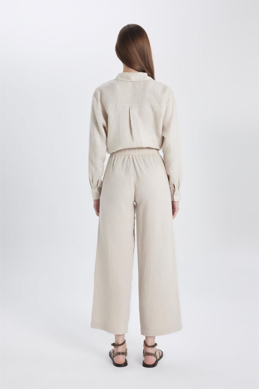 FEMME Beige Pantalon Palazzo Mousseline