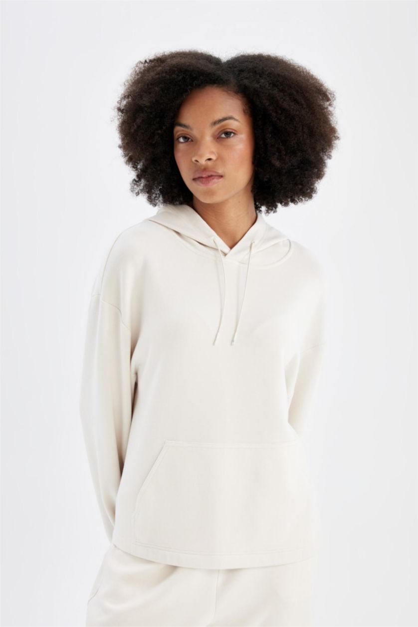 حريمي بيج فاتح سويت شيرت رياضي اوفر سايز بيج بكابيشون من DeFactoFit