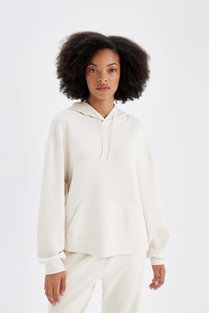 حريمي بيج فاتح سويت شيرت رياضي اوفر سايز بيج بكابيشون من DeFactoFit