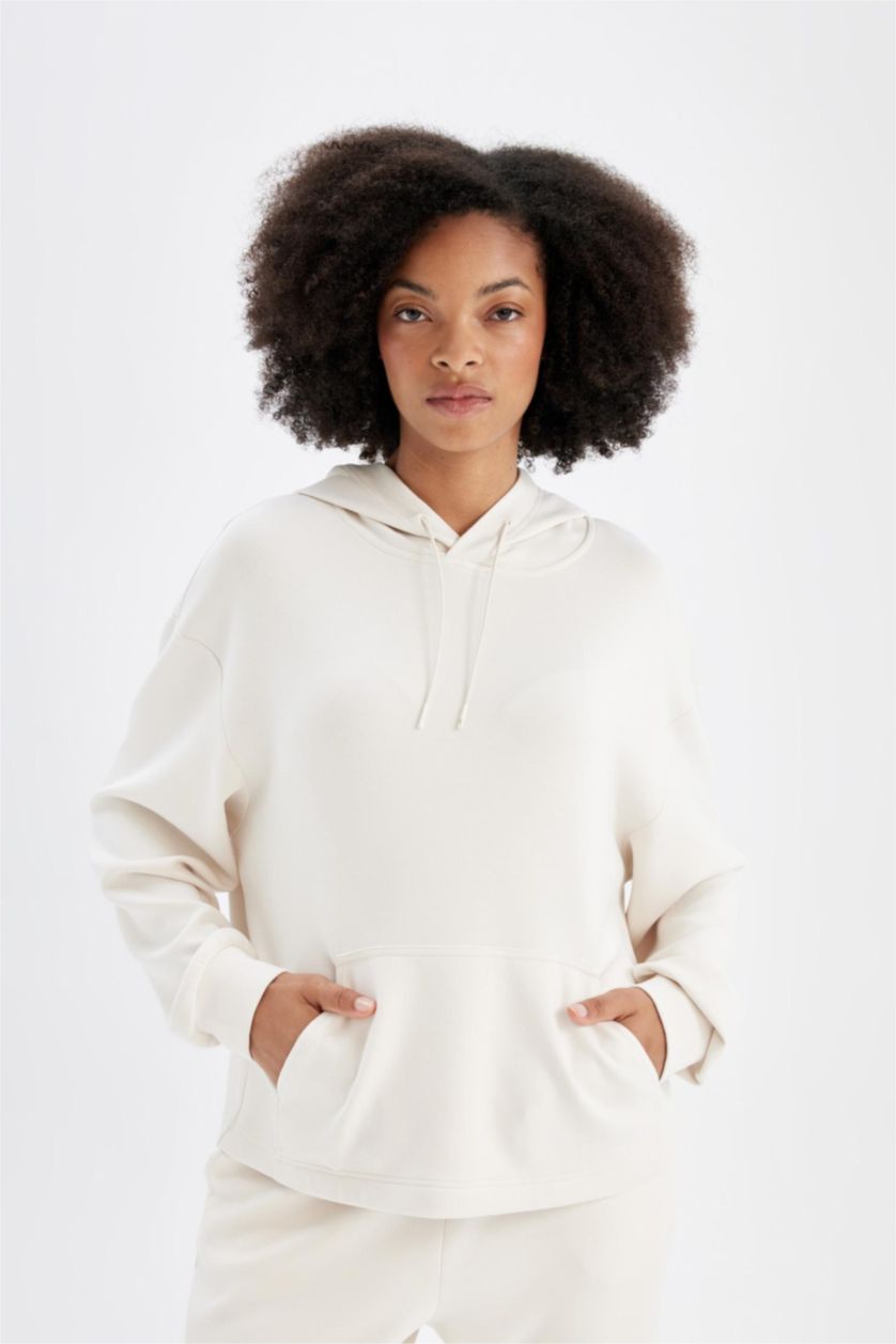 حريمي بيج فاتح سويت شيرت رياضي اوفر سايز بيج بكابيشون من DeFactoFit