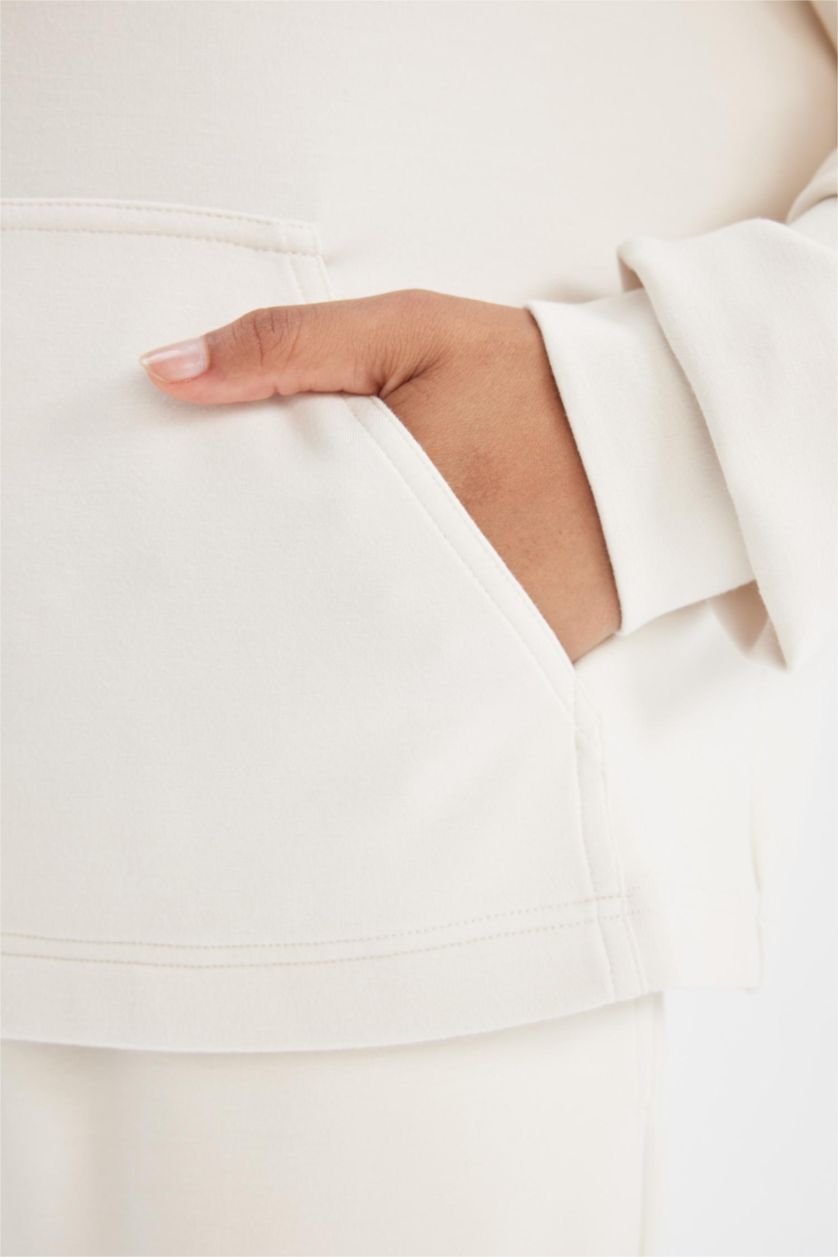 حريمي بيج فاتح سويت شيرت رياضي اوفر سايز بيج بكابيشون من DeFactoFit