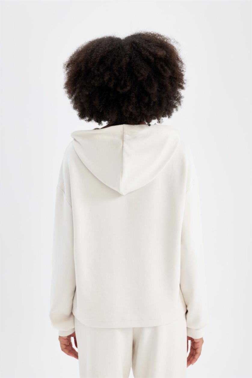 حريمي بيج فاتح سويت شيرت رياضي اوفر سايز بيج بكابيشون من DeFactoFit