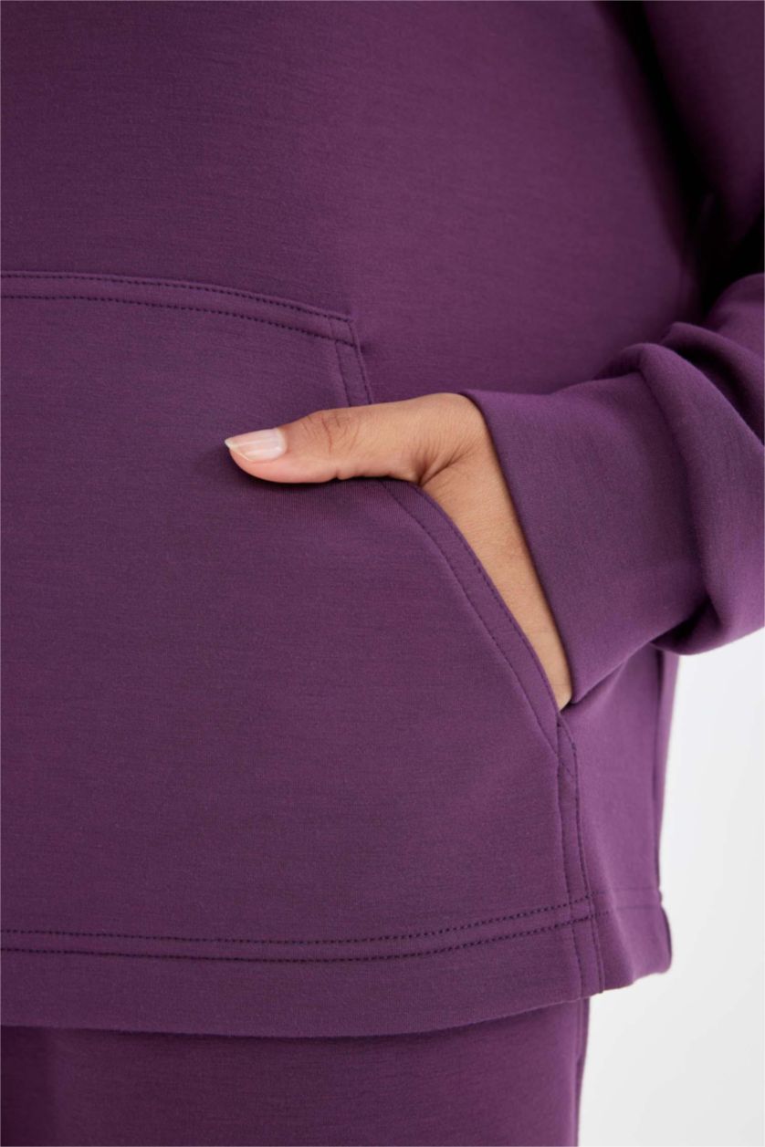 نساء اللون البرقوقي سويت شيرت رياضي واسع برقبة عالية بجيب من DeFactoFit