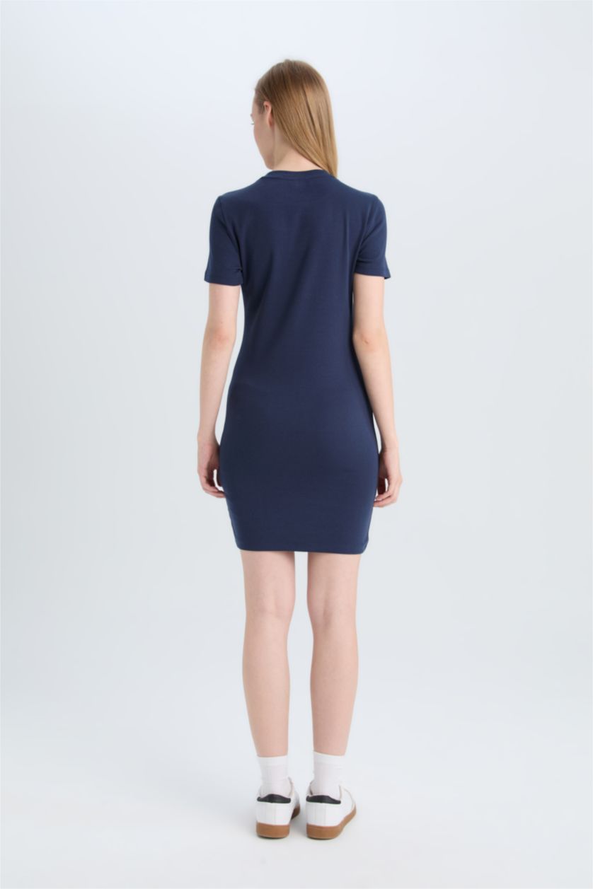 FEMME Marin Robe courte moulante côtelée à manches courtes et col rond