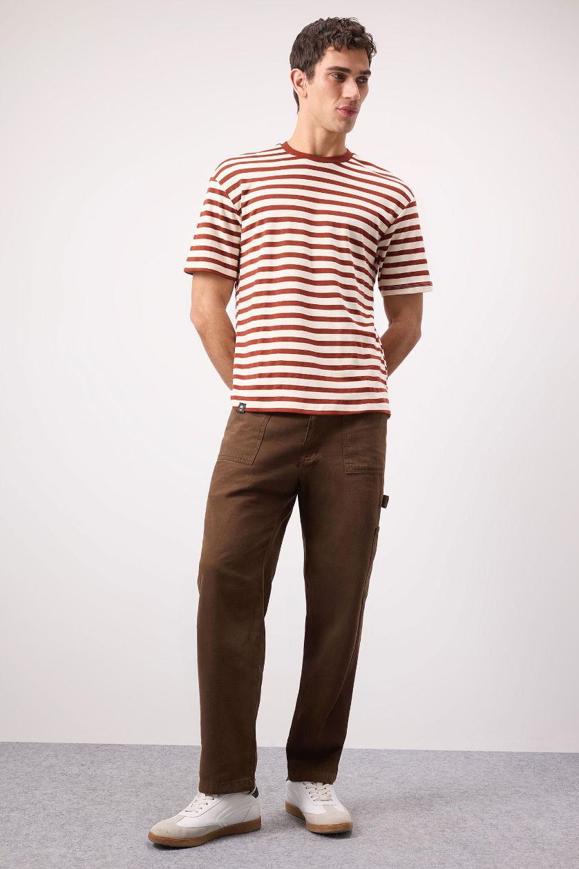 رجال برتقلي غامق تيشيرت مخطط نص ردن اوفر سايز بياخة مستديرة