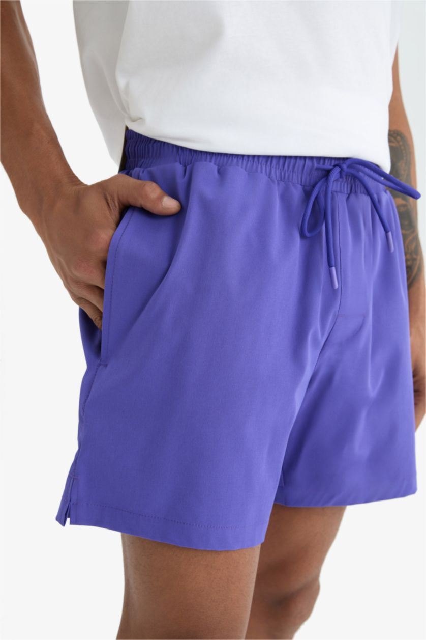 MAN Purple DeFactoFit Sports Printed Flexible Textured Swim Shorts