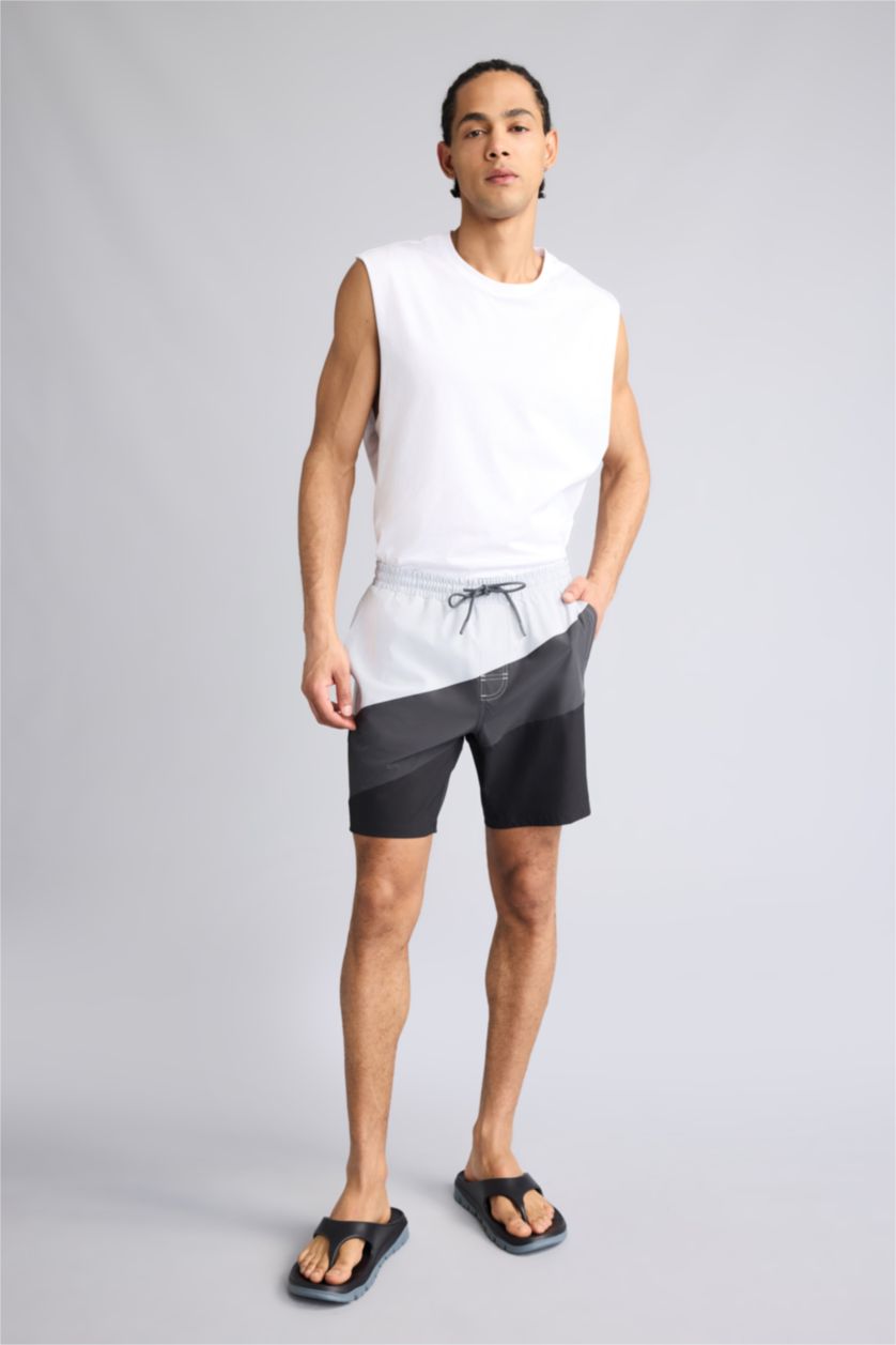 رجال أنثرا شورت بحر قصير قصة عادية محكم من DeFactoFit