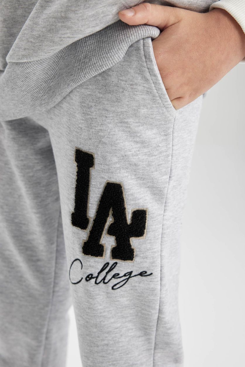 Erkek Çocuk - Genç Erkek Gri Melanj Beli Bağcıklı Lastikli Paça Cepli Baskılı Gri Jogger Eşofman Altı Erkek Çocuk