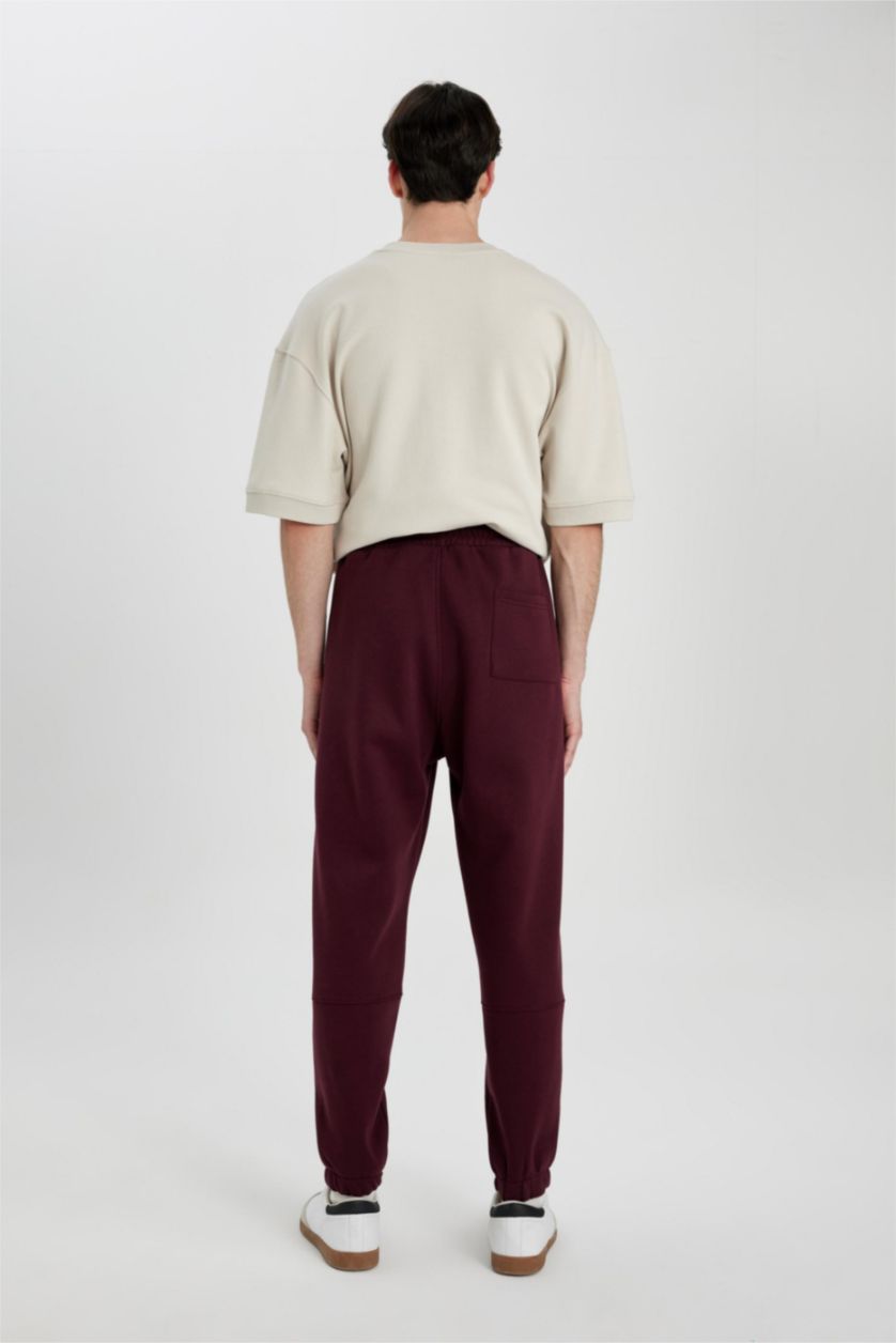 رجالي خمري بنطلون سويت بانتس بقصة عادية بجيب