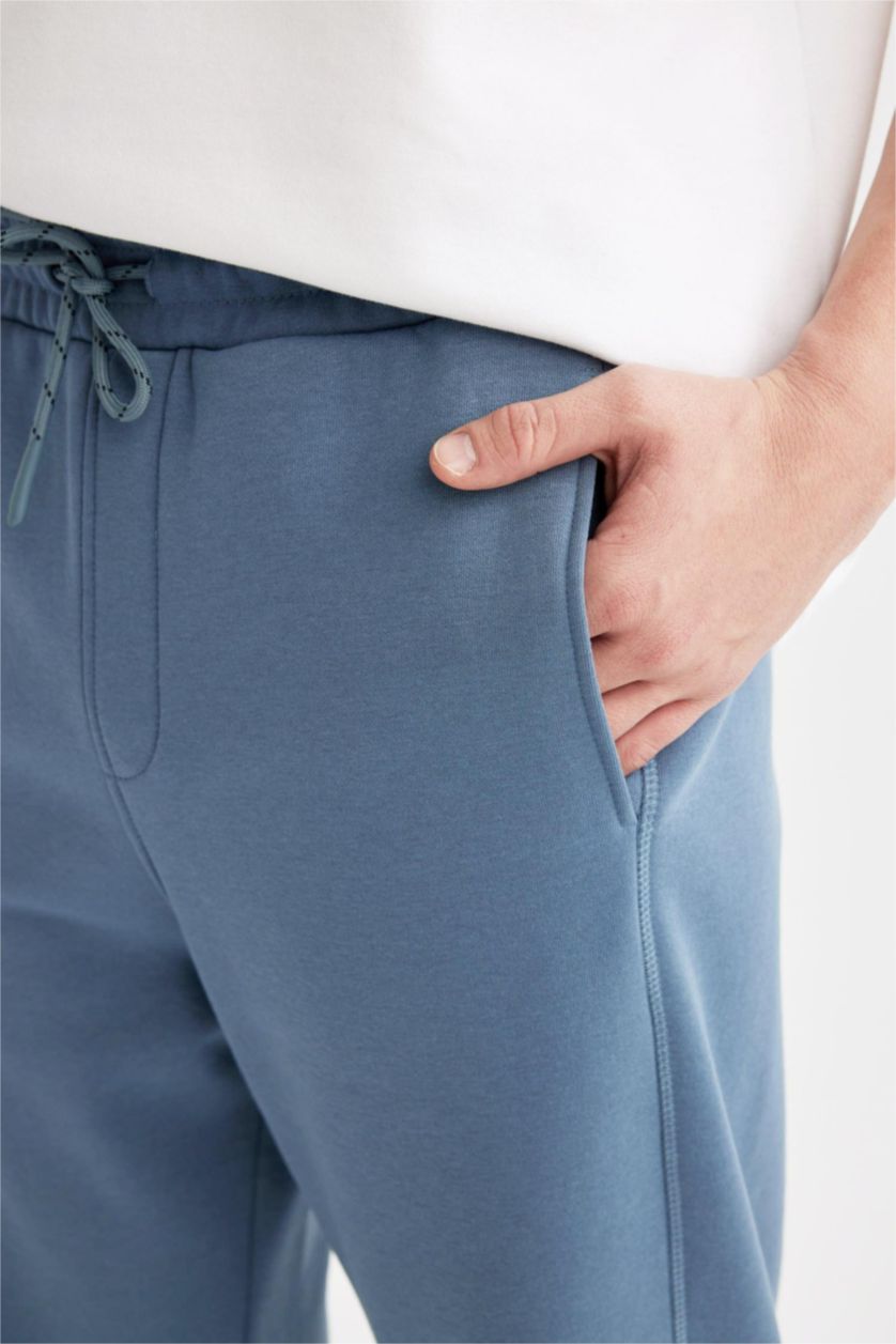 MAN Light Indigo Regular Fit With Pockets Trousers