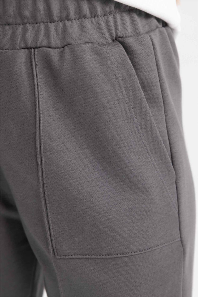 Kız Çocuk - Genç Kız Koyu Gri Kız Çocuk Beli ve Paçası Lastikli Cepli  Jogger Eşofman Altı