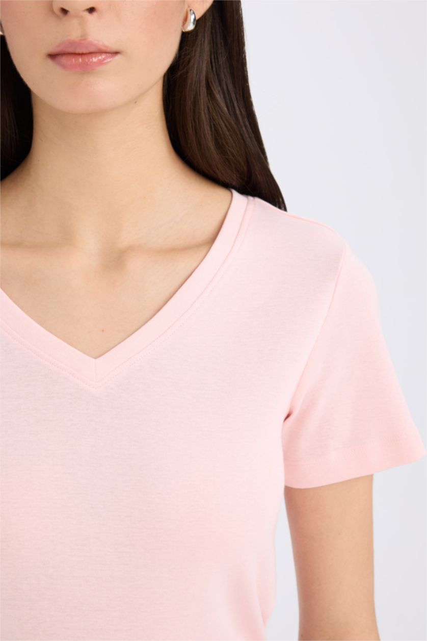 نساء زهري فاتح تيشيرت سادة مضلع قصة عادية بياخة V