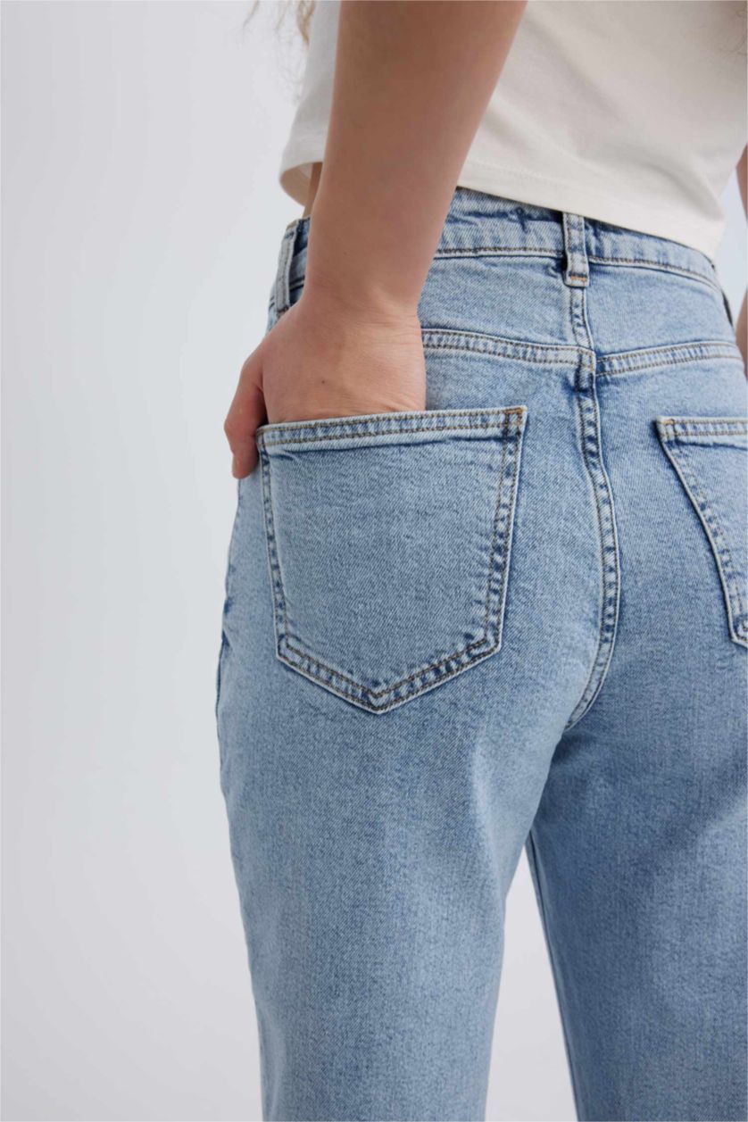 نساء أزرق فاتح بنطلون جينز فينتج بقصة مستقيمة وخصر عالي وحافة ممزقة