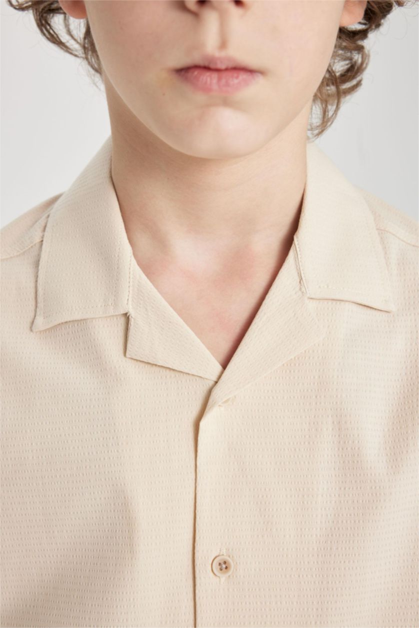 أولادي اللون الرملي قميص بولو اولادي بيج نص كم اوفر سايز