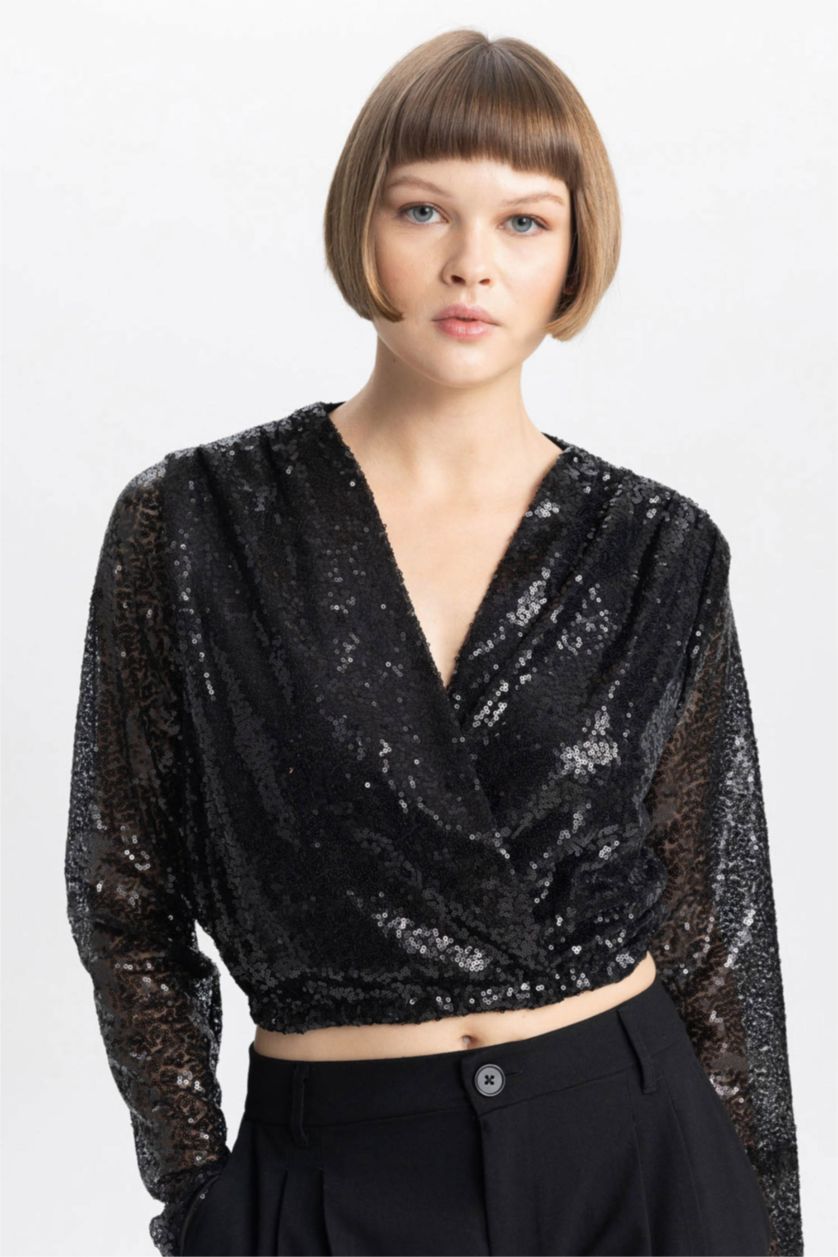 حريمي أسود بلوزة كم طويل بالترتر وقصة عادية