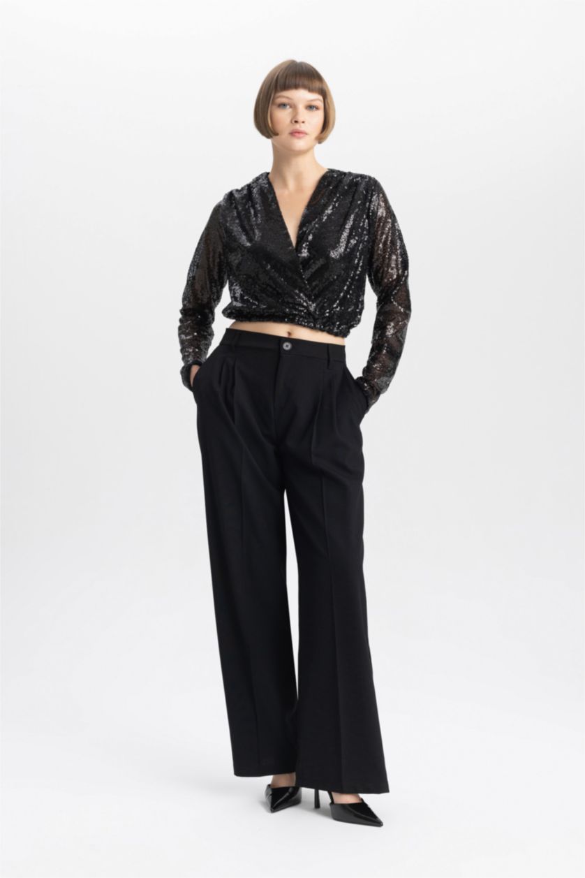 حريمي أسود بلوزة كم طويل بالترتر وقصة عادية