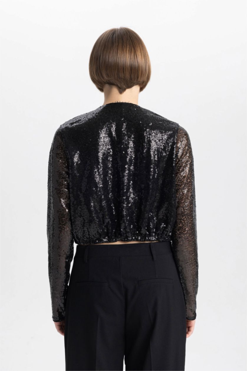 حريمي أسود بلوزة كم طويل بالترتر وقصة عادية