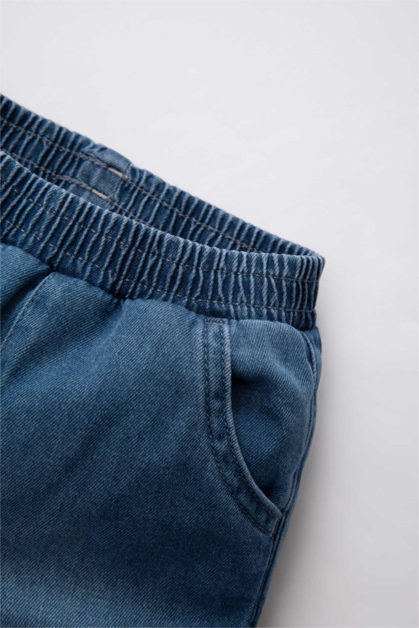 مولود ذكر أزرق بنطلون جينز ولادي قصة عادية بجيب