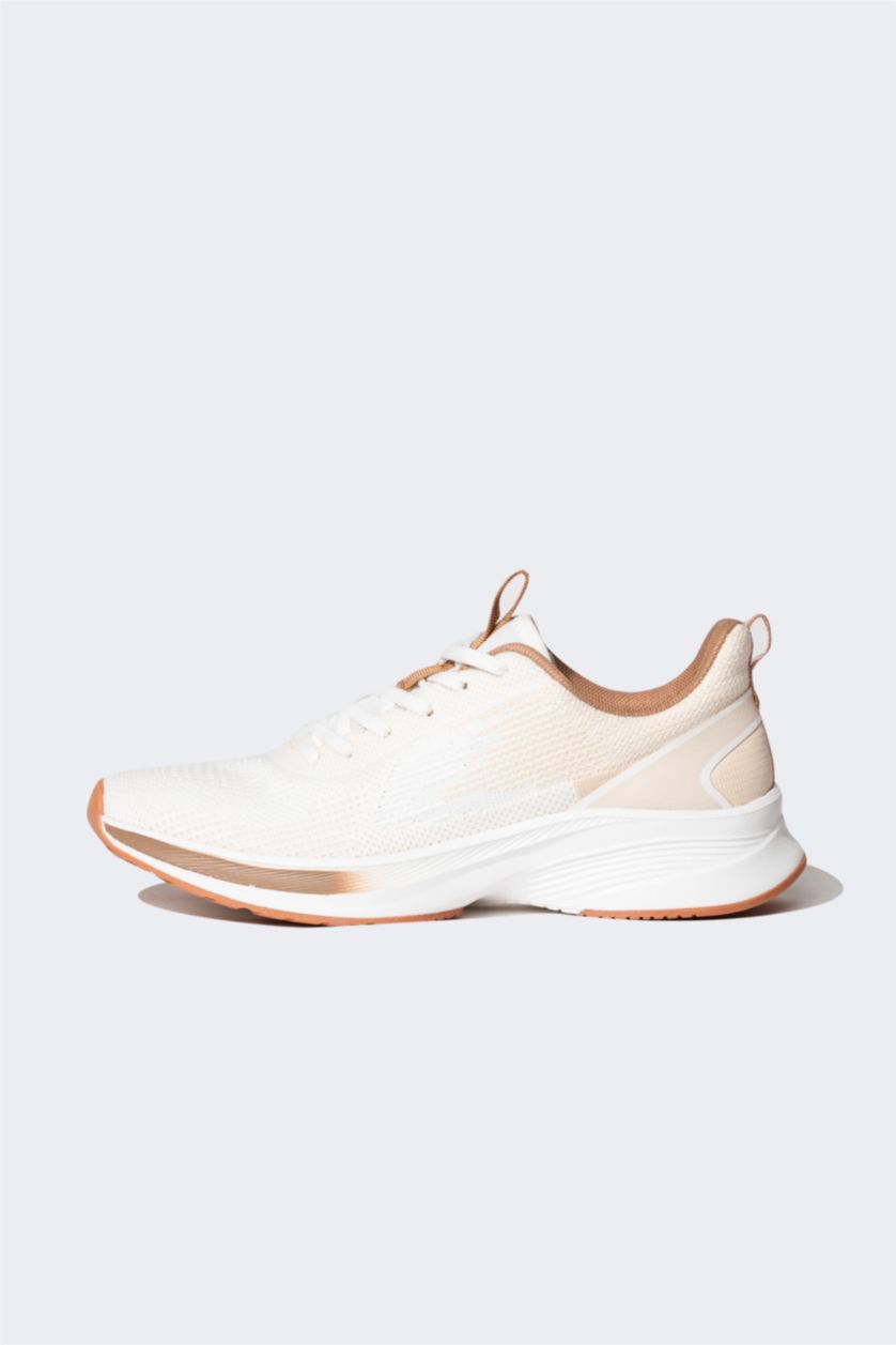 حريمي بني فاتح حذاء رياضي حريمي برباط بكعب مسنن