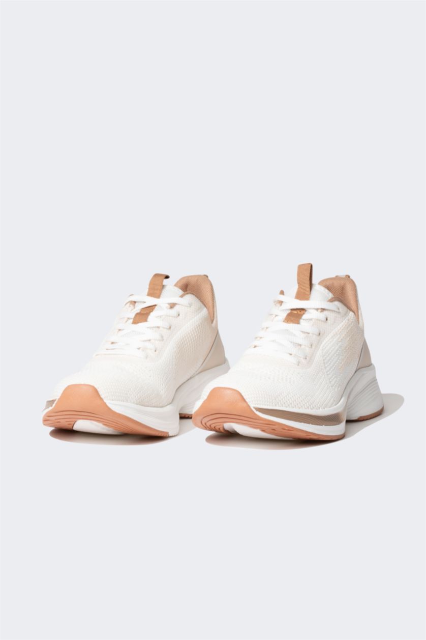 حريمي بني فاتح حذاء رياضي حريمي برباط بكعب مسنن