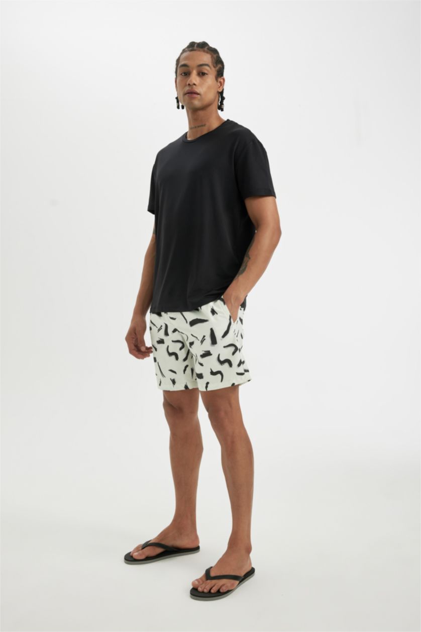 HOMME Beige Short de bain à coupe régulière, doublé de filet et à motifs