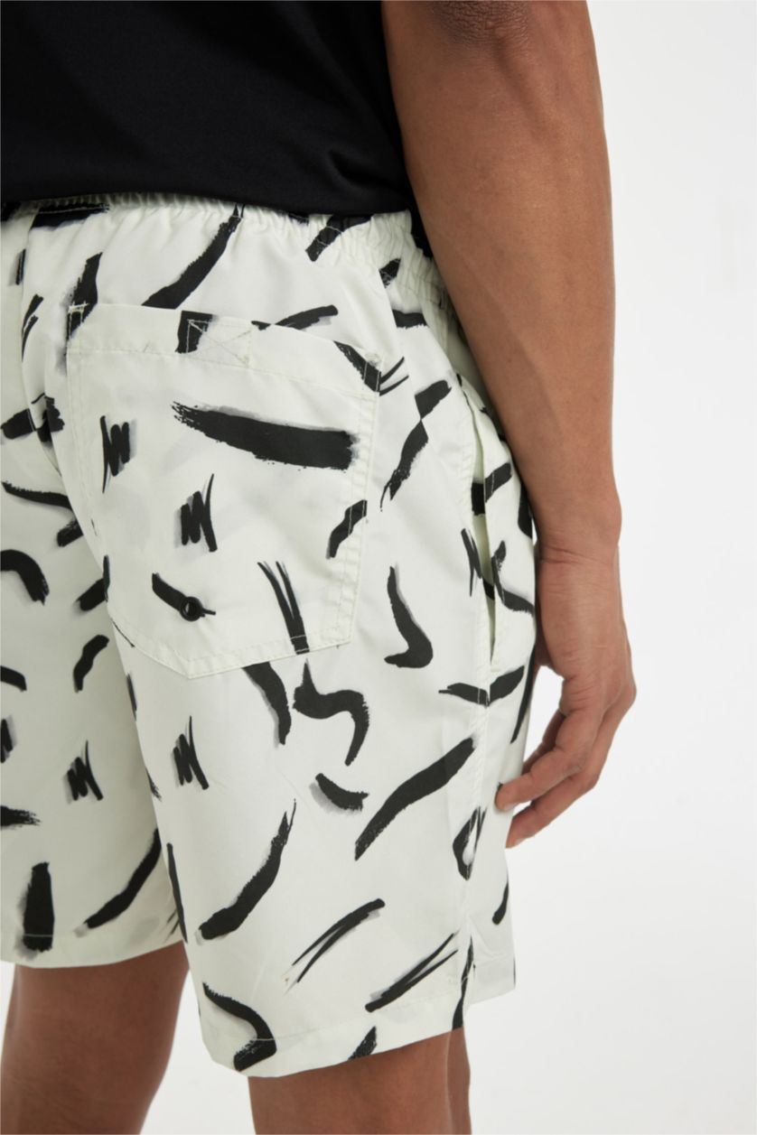 HOMME Beige Short de bain à coupe régulière, doublé de filet et à motifs